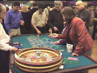Roulette table with dealer at a casino event