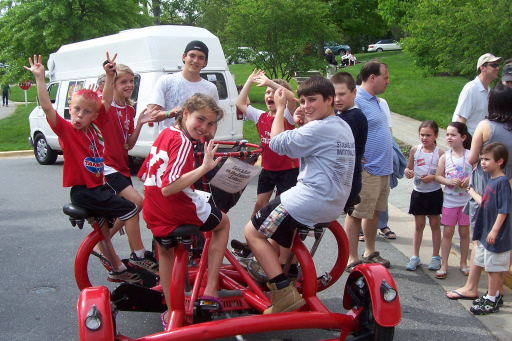 Kids riding the Conference Bike