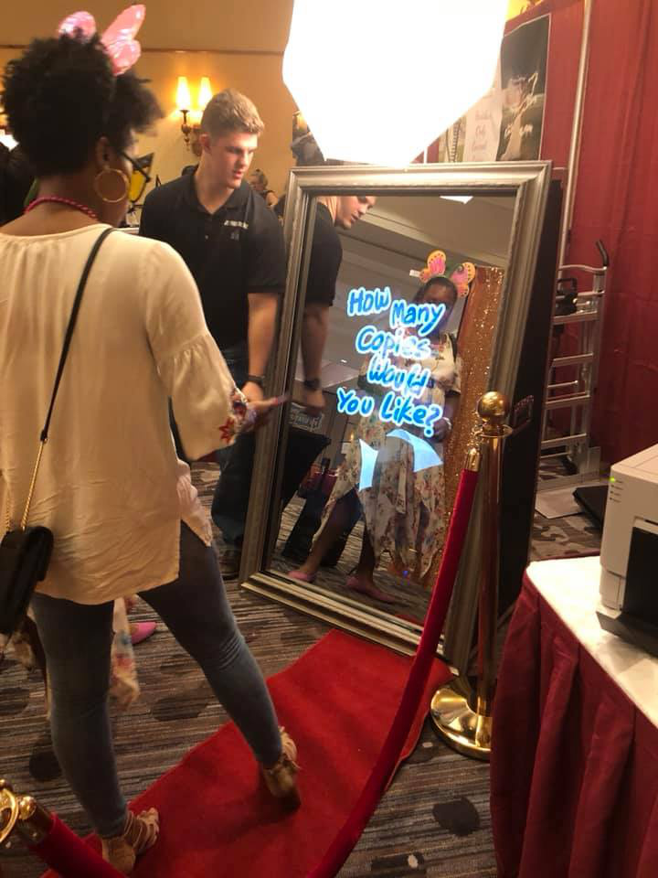 The Magic Mirror Photo Booth with red carpet